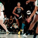 A'ja Wilson brings up the ball in a game against the Seattle Storm at Michelob Ultra Arena.