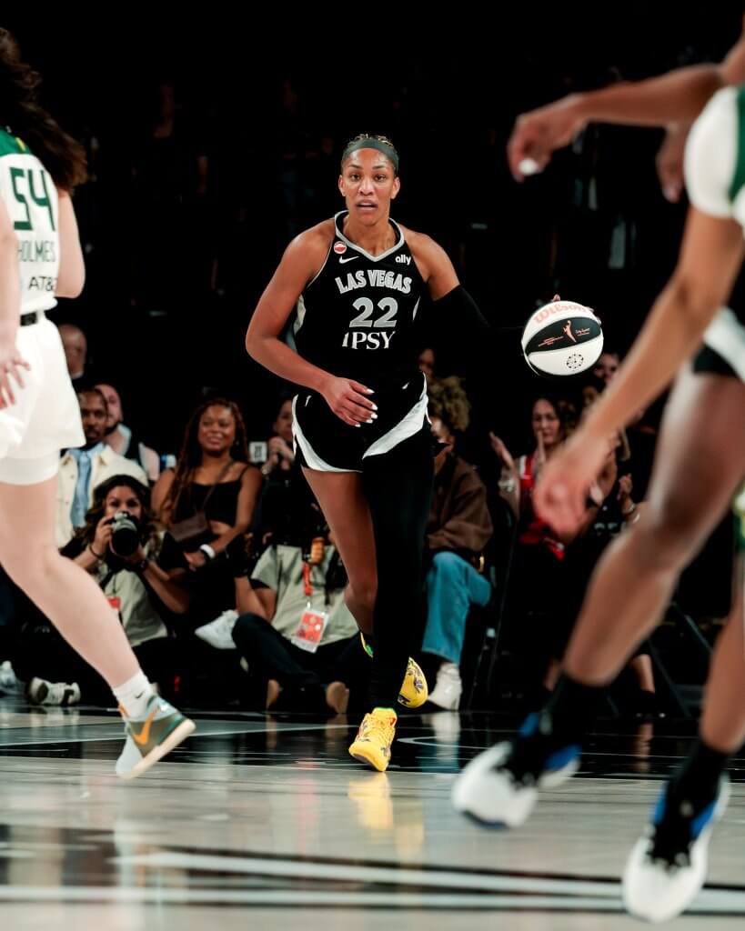 A'ja Wilson brings up the ball in a game against the Seattle Storm at Michelob Ultra Arena.