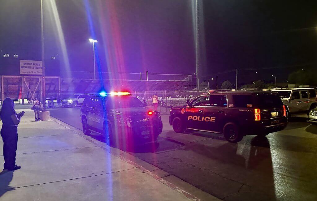 Police respond to the brawl that erupted in the first quarter of a football game between the Cheyenne Desert Shields and Eldorado Firehawks at Cheyenne High School on Sept. 4. Both teams were disqualified and the game was cancelled.