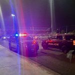Police respond to the brawl that erupted in the first quarter of a football game between the Cheyenne Desert Shields and Eldorado Firehawks at Cheyenne High School on Sept. 4. Both teams were disqualified and the game was cancelled.