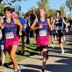 Shadow Ridge High School cross country runners Logan Larson (front) and McCouy Hackman start the CSN Invitational 5K in Las Vegas, Saturday, Oct. 3.